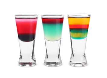 Photo of Different shooters in shot glasses isolated on white