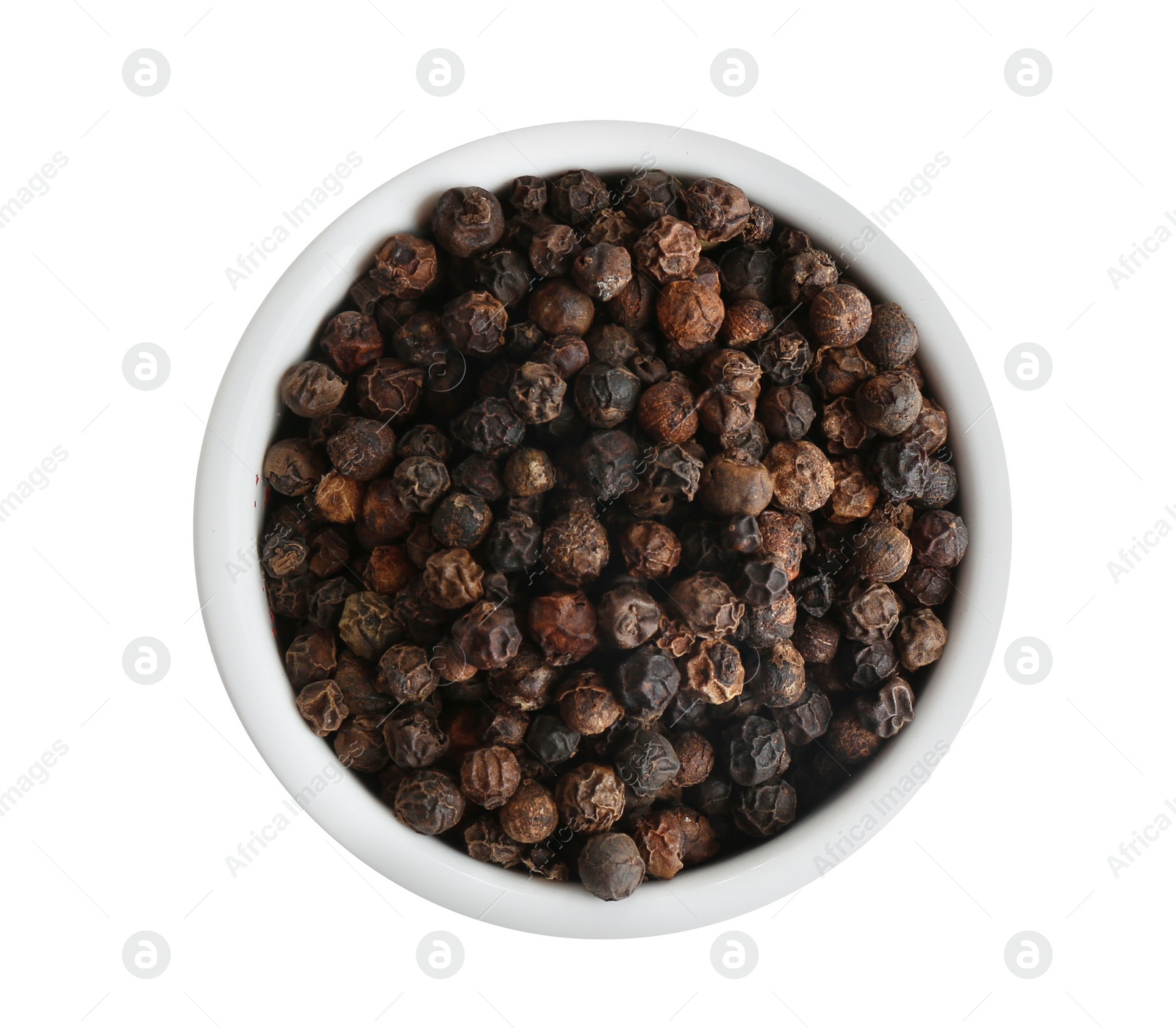 Photo of Bowl of black peppercorns isolated on white, top view