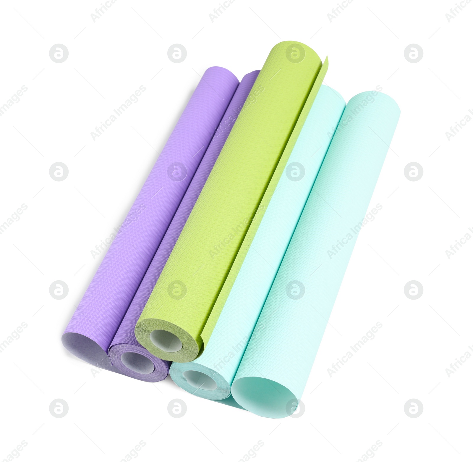 Photo of Three colorful wallpaper rolls isolated on white