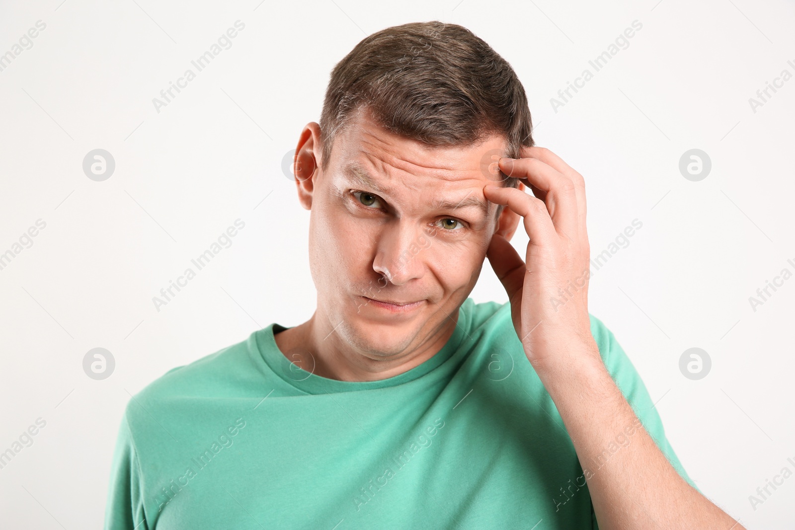 Photo of Emotional man in casual outfit on white background