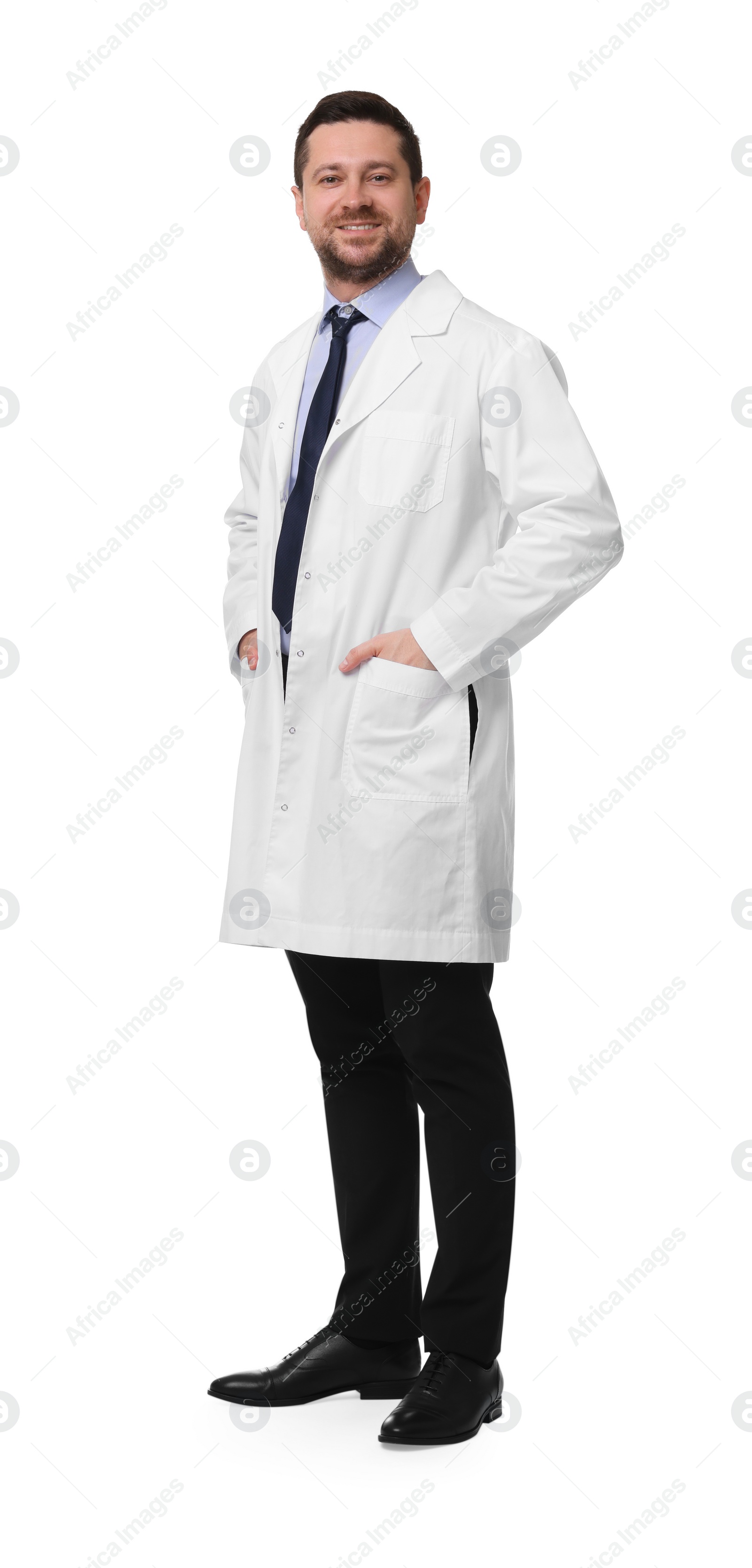 Photo of Full length portrait of smiling doctor isolated on white