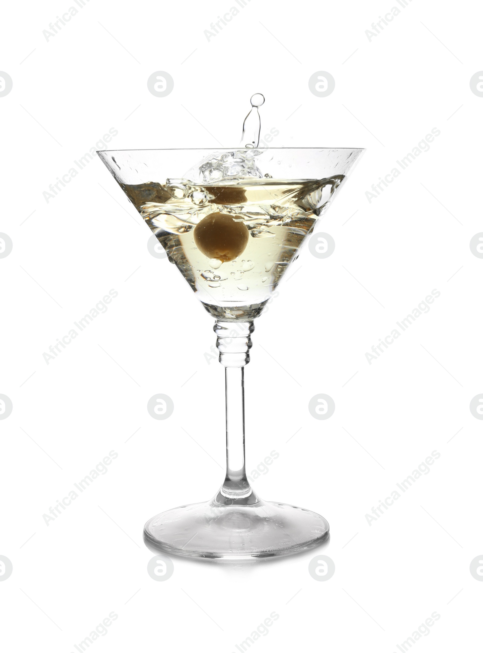 Photo of Glass of classic martini with splash on white background