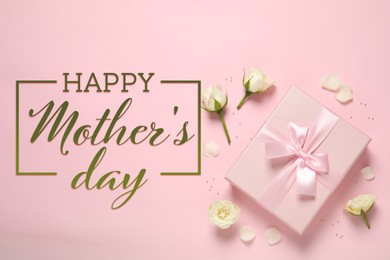 Happy Mother's Day. Greeting card with gift box and beautiful flowers on pink background, flat lay