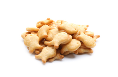 Delicious crispy goldfish crackers on white background