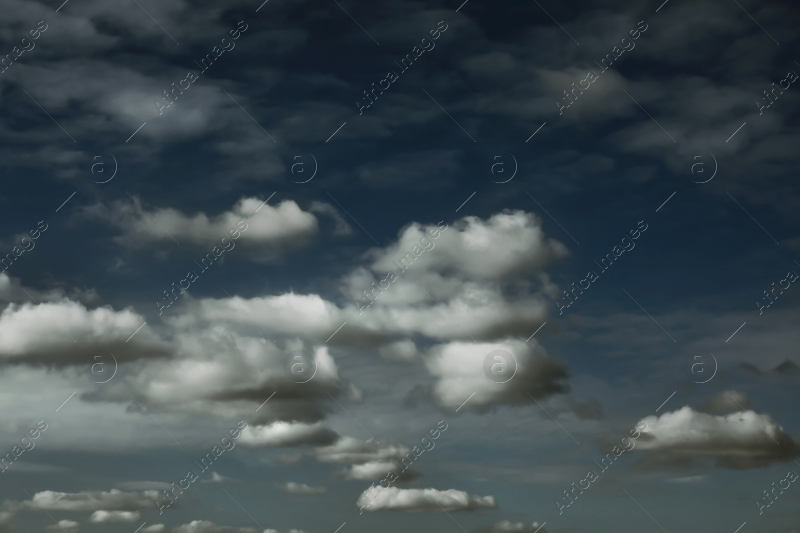 Image of Sky covered with rainy clouds. Stormy weather