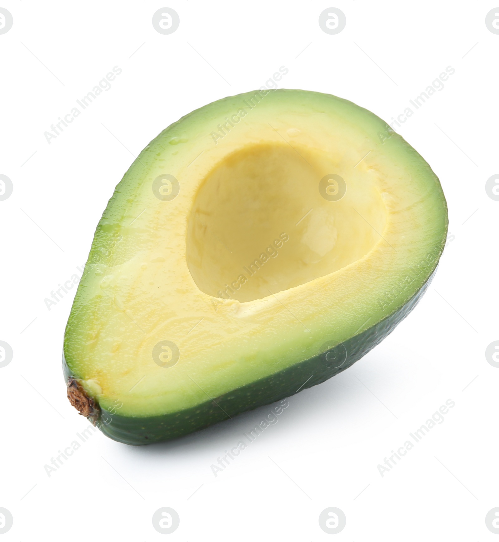 Photo of Half of ripe avocado on white background