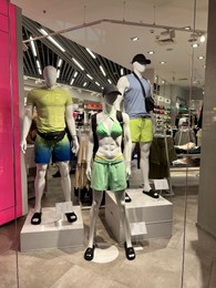 Photo of WARSAW, POLAND - JULY 17, 2022: Fashion store display with clothes on mannequins in shopping mall