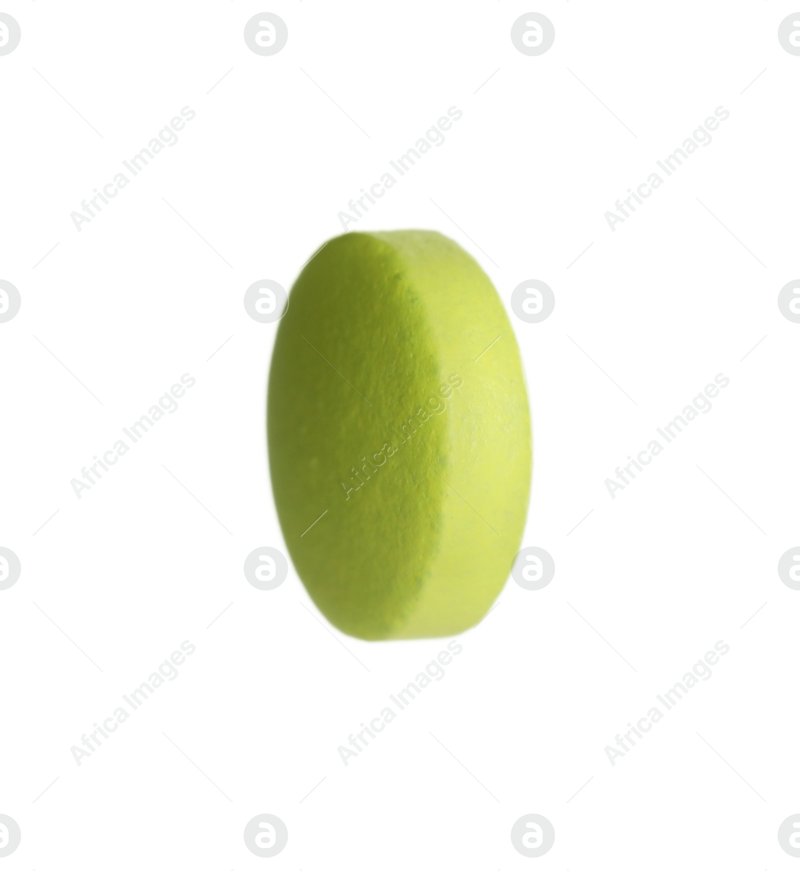 Photo of One light green pill isolated on white