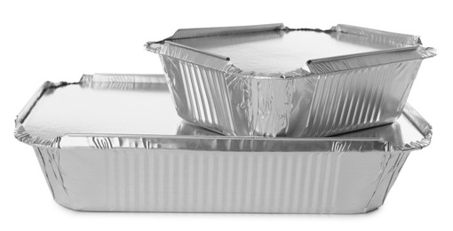 Photo of Foil containers for food on white background