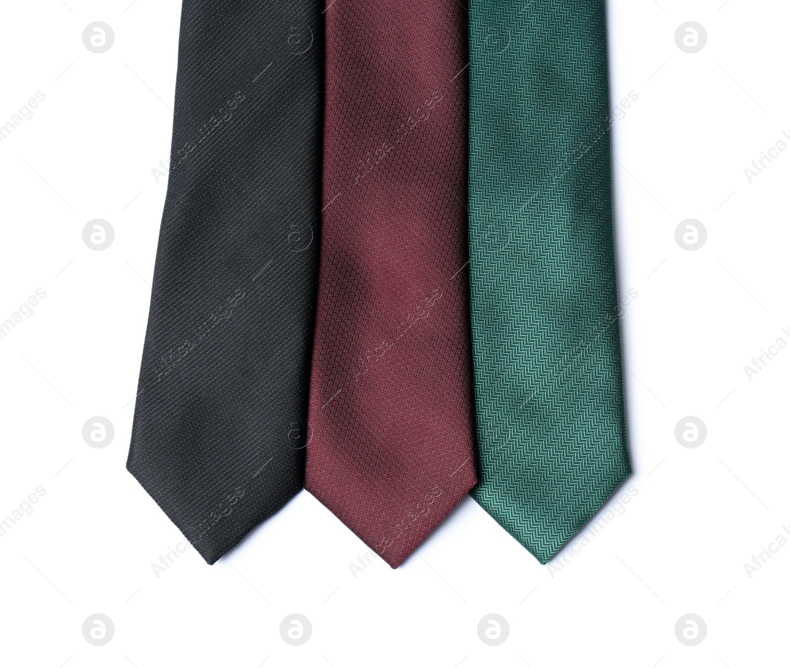 Photo of Group of colorful neckties isolated on white