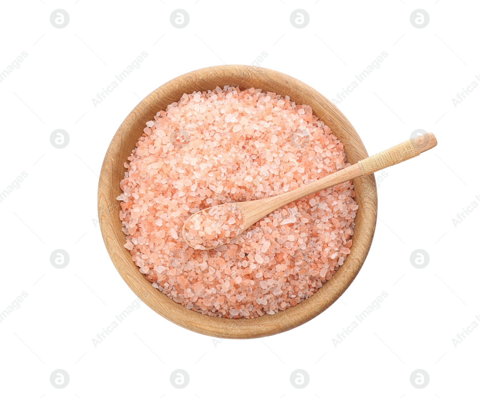 Photo of Wooden bowl and spoon with pink himalayan salt on white background, top view