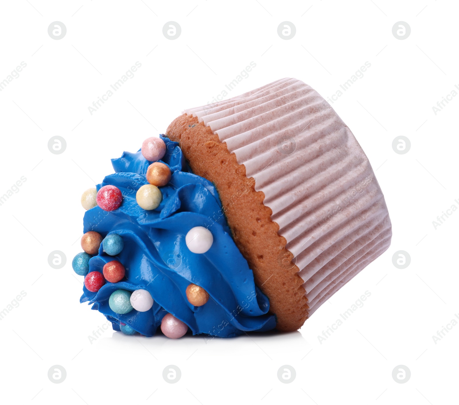 Photo of Dropped cupcake with cream on white background. Troubles happen