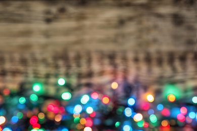 Blurred view of Christmas lights on table