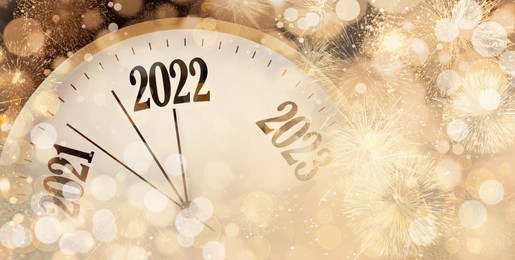 Image of Clock counting last moments to New 2022 Year and beautiful fireworks on background, banner design