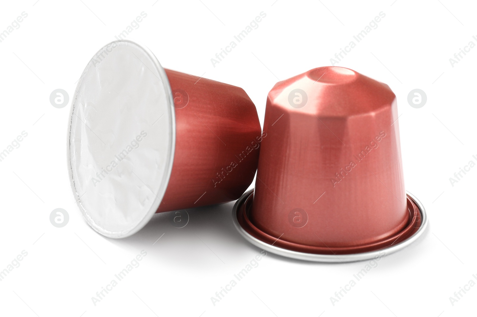 Photo of Two plastic coffee capsules isolated on white