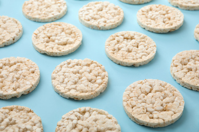 Photo of Puffed rice cakes on light blue background
