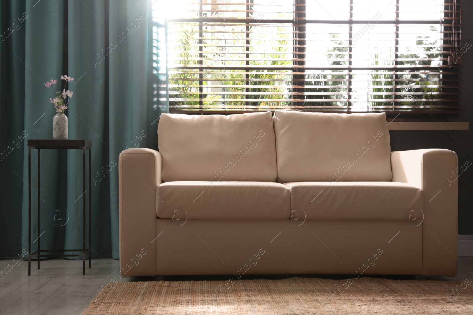 Photo of Stylish living room interior with elegant leather sofa