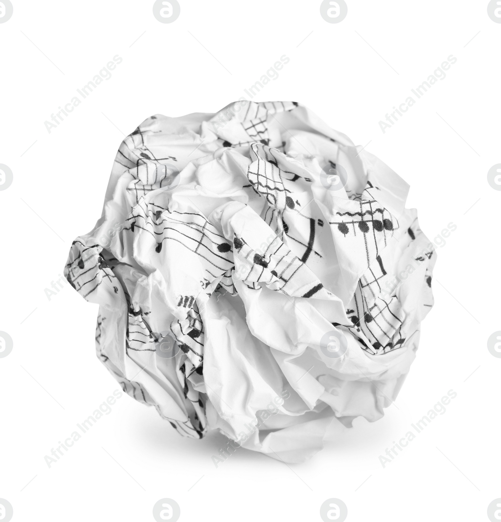 Photo of Crumpled sheet of paper with musical notes isolated on white