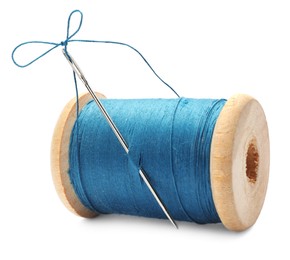 Light blue sewing thread with needle on white background