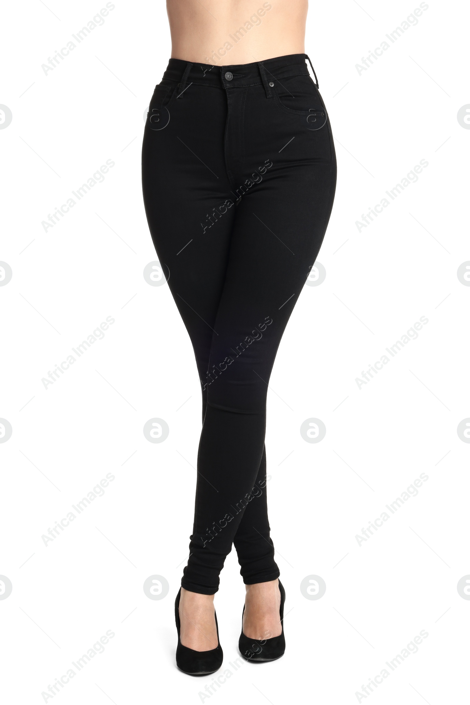 Photo of Woman wearing stylish black jeans and high heels shoes on white background, closeup