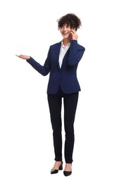 Photo of Beautiful businesswoman in suit talking on smartphone against white background
