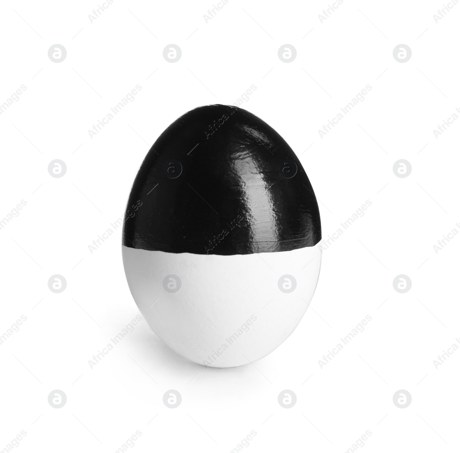 Photo of Painted Easter egg on white background. Stylish design