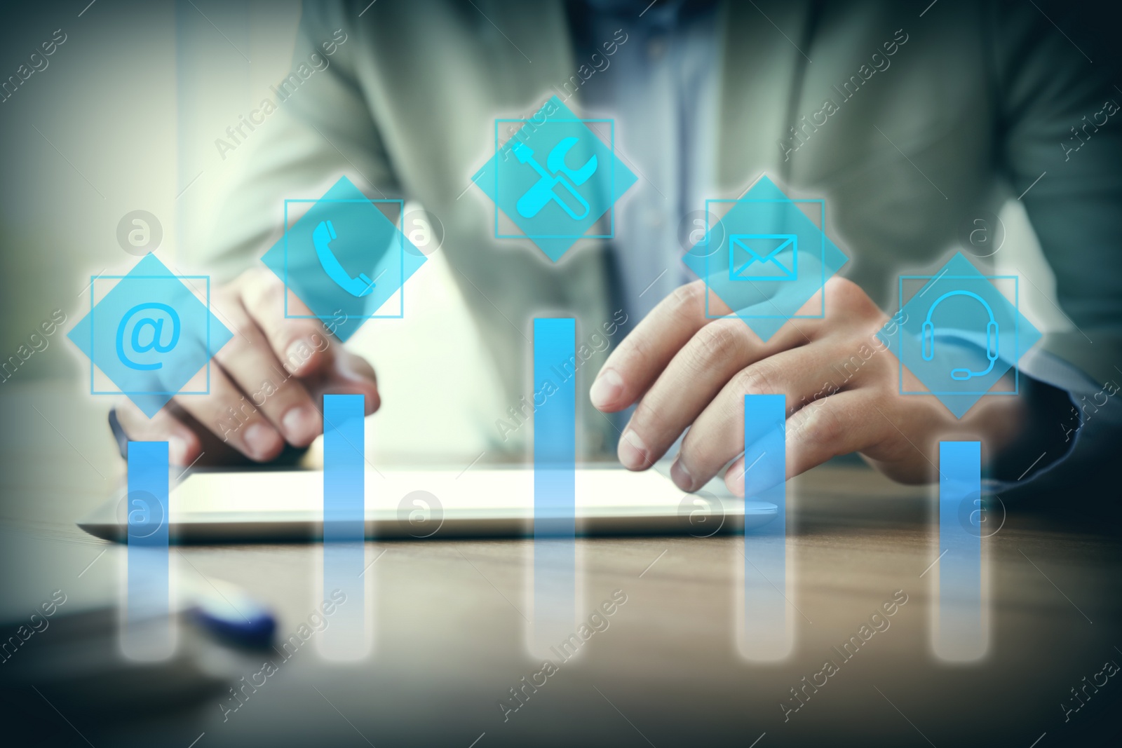 Image of Businessman working with modern tablet at table, closeup. Technical support