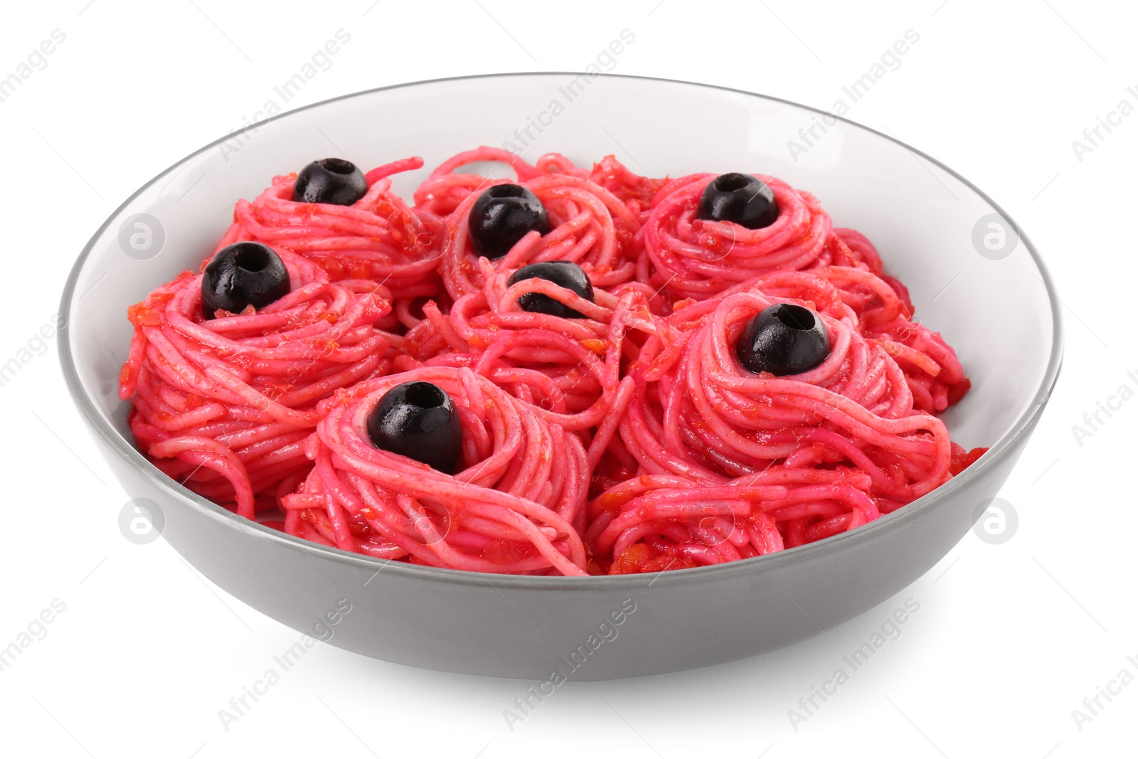 Photo of Red pasta with olives in bowl isolated on white. Halloween food