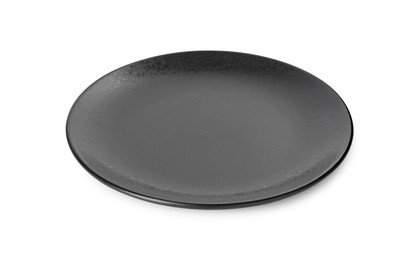 Photo of One beautiful black plate isolated on white