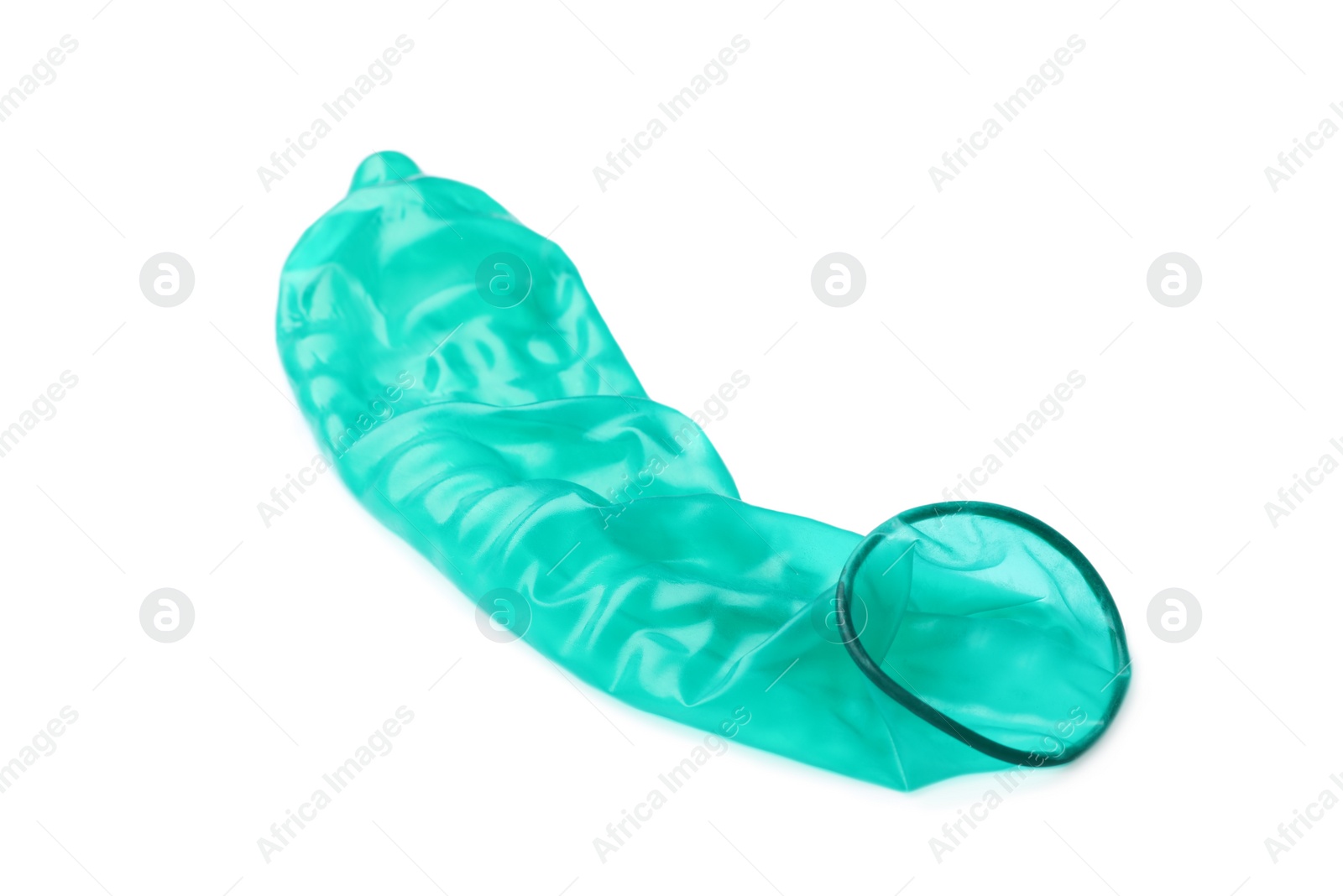 Photo of Green used condom on white background. Safe sex concept