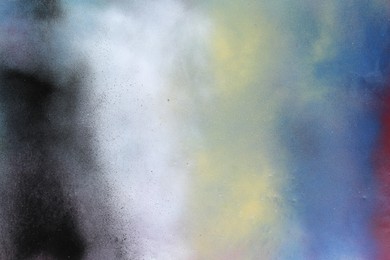 Photo of Texture of abstract spray paint as background, top view