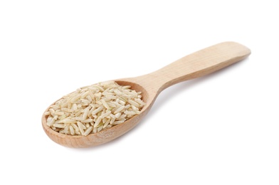 Wooden spoon with brown rice on white background