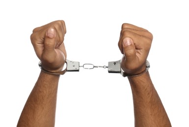 Man in handcuffs on white background, closeup