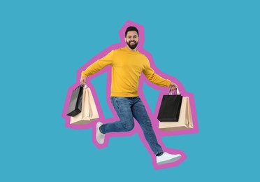 Image of Happy man with shopping bags jumping on light blue background