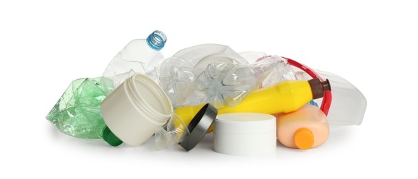 Photo of Pile of plastic garbage on white background