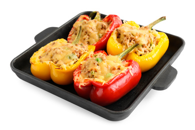 Photo of Tasty stuffed bell peppers in baking pan isolated on white