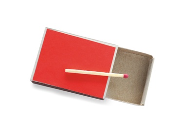 Photo of Cardboard box with match on white background, top view. Space for design