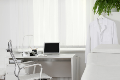 Doctor's workplace near window in medical office