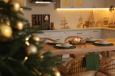 Photo of Cozy kitchen decorated for Christmas dinner. Interior design