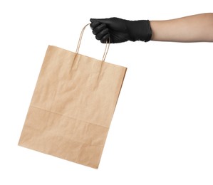 Woman holding shopping paper bag on white background