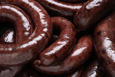 Photo of Tasty blood sausages as background, closeup view
