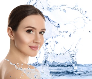 Image of Beautiful young woman and splashing water on white background. Spa portrait