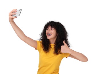 Photo of Beautiful young woman taking selfie on white background