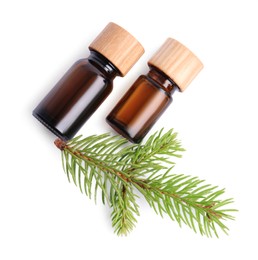 Bottles of pine essential oil on white background, top view