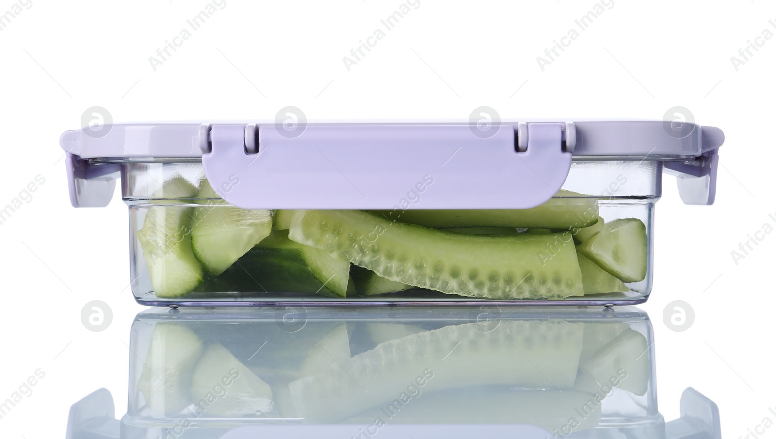 Photo of Box with cut fresh raw cucumbers on white background