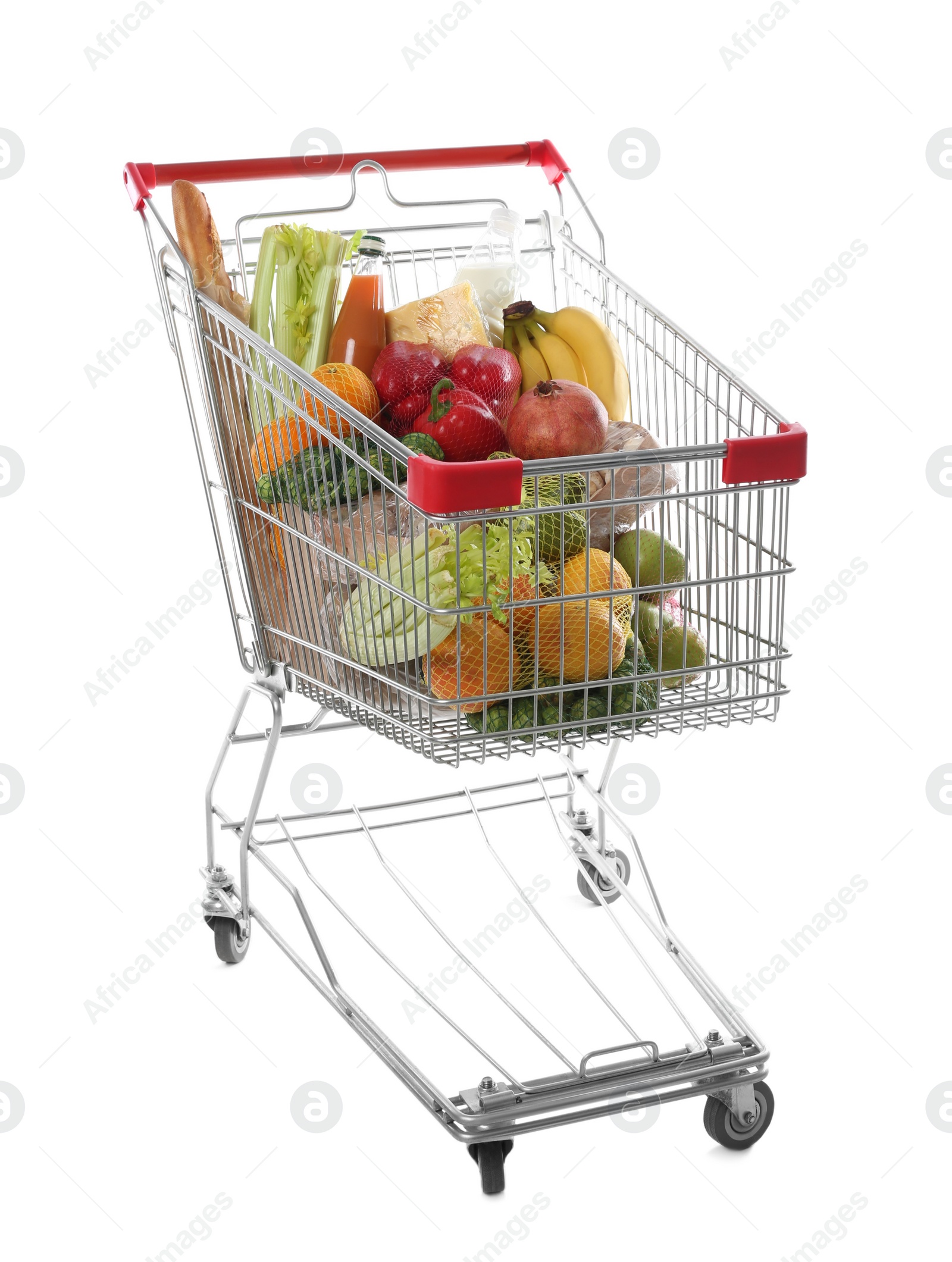 Photo of Shopping cart with fresh groceries on white background