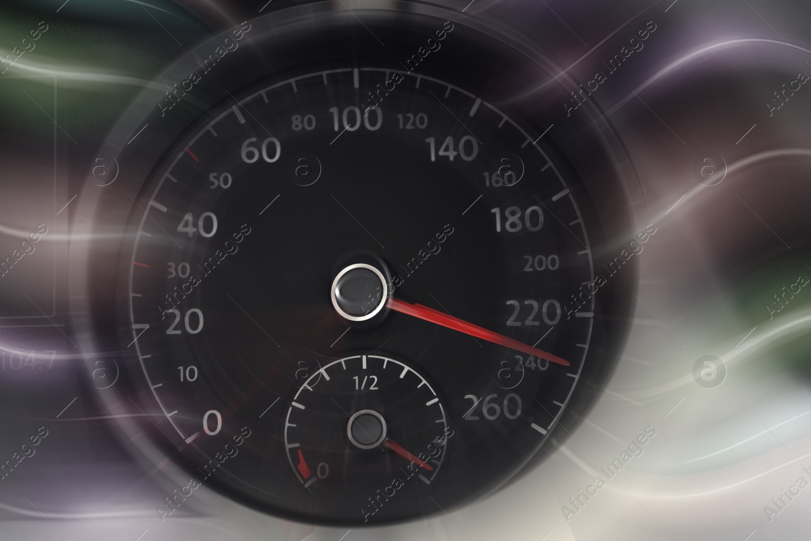Image of Speedometer on dashboard in car, motion blur effect