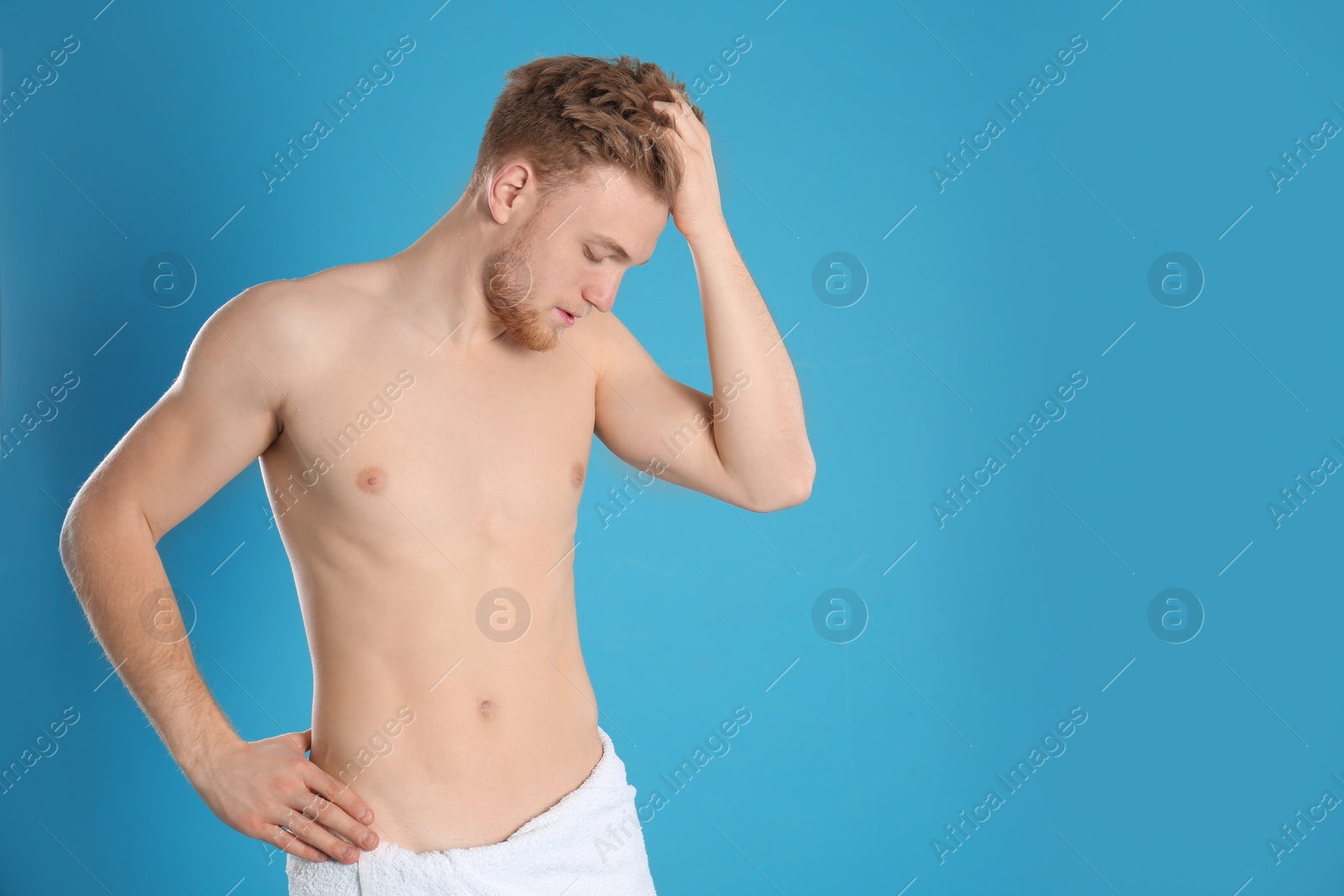 Photo of Handsome man with slim body on color background. Space for text