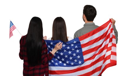 4th of July - Independence day of America. Family with national flags of United States on white background, back view