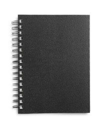 Photo of One notebook with black cover isolated on white, top view